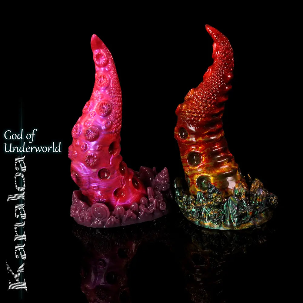 Kanaloa fantasy tentacle silicone dildo by Love Smiths in two colour blends, displayed upright on black reflective background with coral-like sculpted base.
