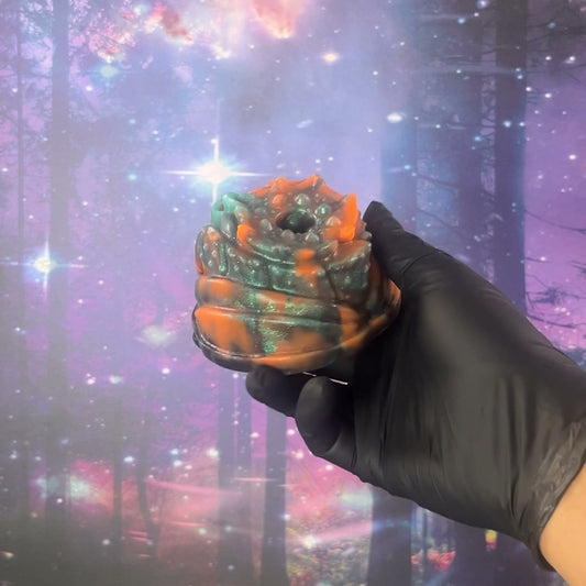 Qilin Mignonne - Ready to Ship; Grey-green and orange marbling. Its glow in the dark is shown in the video.